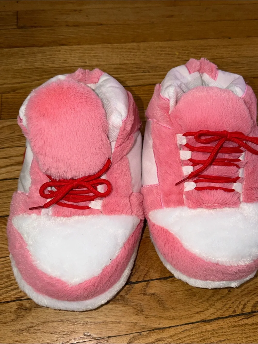 One size fits all nike plushies slippers